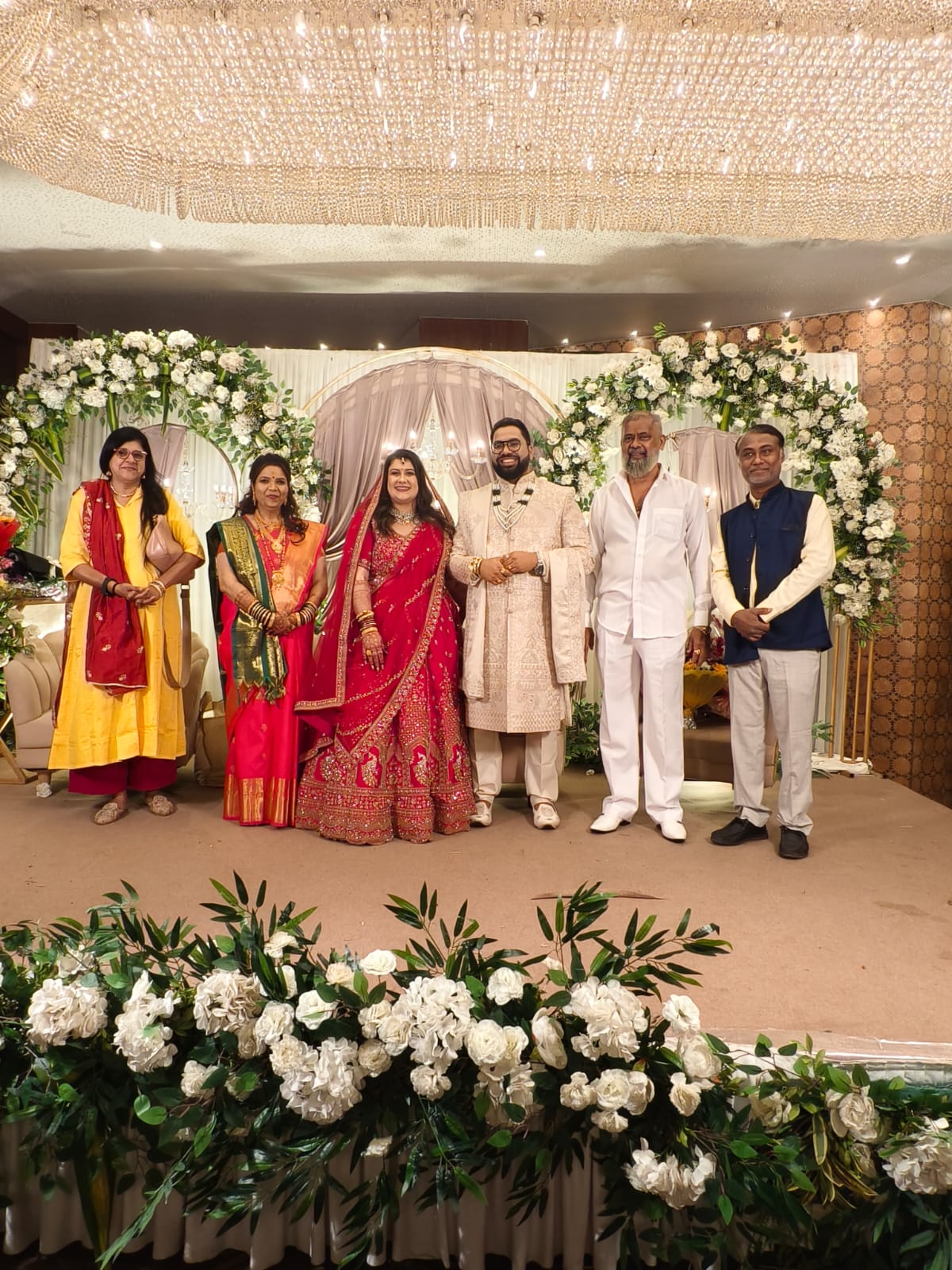 Second Couple celebrating with family at their wedding